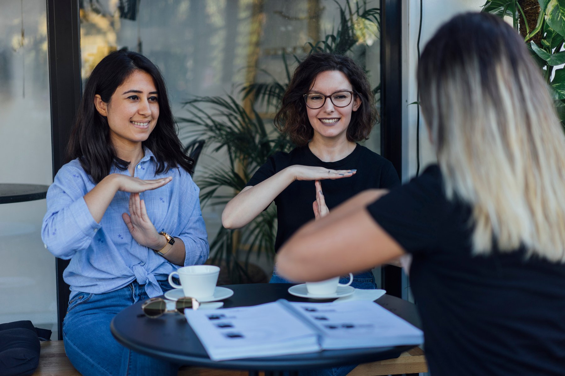 Young women learn to speak in sign language